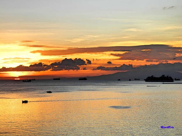 マニラ湾、夕陽、出港